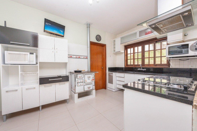 Imagem Casa com 4 Quartos à Venda, 234 m² em Santa Felicidade - Curitiba Imagem Casa com 4 Quartos à Venda, 234 m² em Santa Felicidade - Curitiba