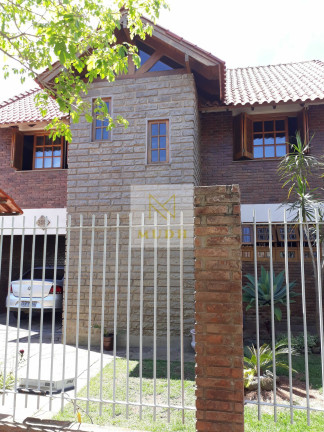 Imagem Casa com 3 Quartos à Venda, 268 m² em Espírito Santo - Porto Alegre Imagem Casa com 3 Quartos à Venda, 268 m² em Espírito Santo - Porto Alegre