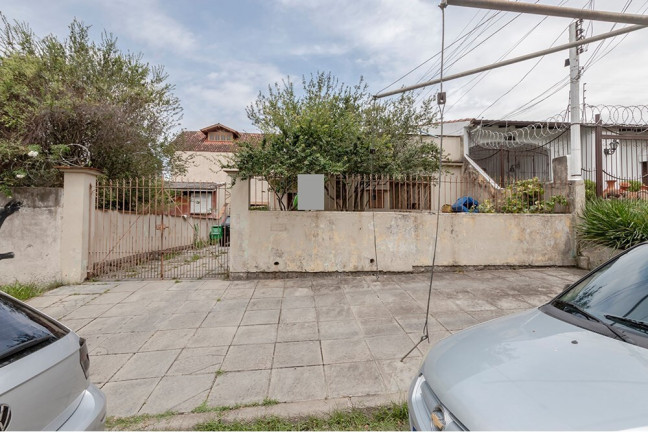 Imagem Casa com 4 Quartos à Venda, 170 m² em Vila Nova - Porto Alegre Imagem Casa com 4 Quartos à Venda, 170 m² em Vila Nova - Porto Alegre