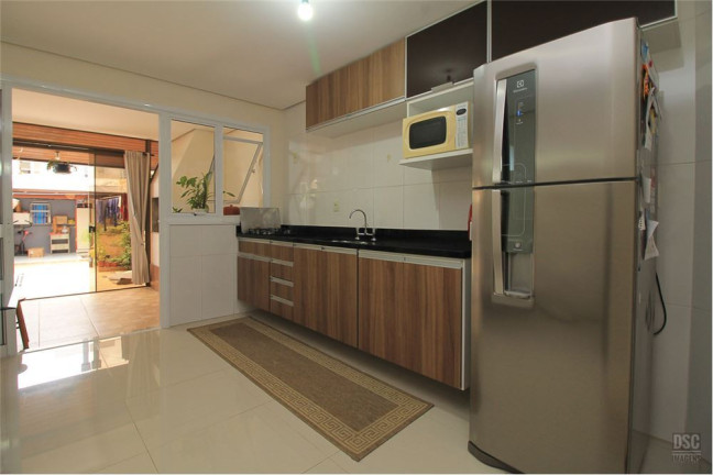 Imagem Casa com 3 Quartos à Venda, em Guarujá - Porto Alegre Imagem Casa com 3 Quartos à Venda, em Guarujá - Porto Alegre