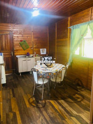 Imagem Casa com 4 Quartos à Venda, 120 m² em Centro - Torres Imagem Casa com 4 Quartos à Venda, 120 m² em Centro - Torres