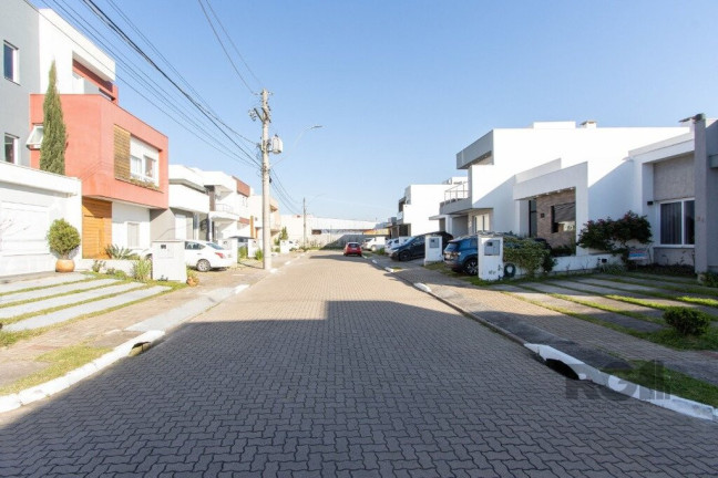 Imagem Casa de Condomínio com 3 Quartos à Venda, 112 m² em Hípica - Porto Alegre Imagem Casa de Condomínio com 3 Quartos à Venda, 112 m² em Hípica - Porto Alegre