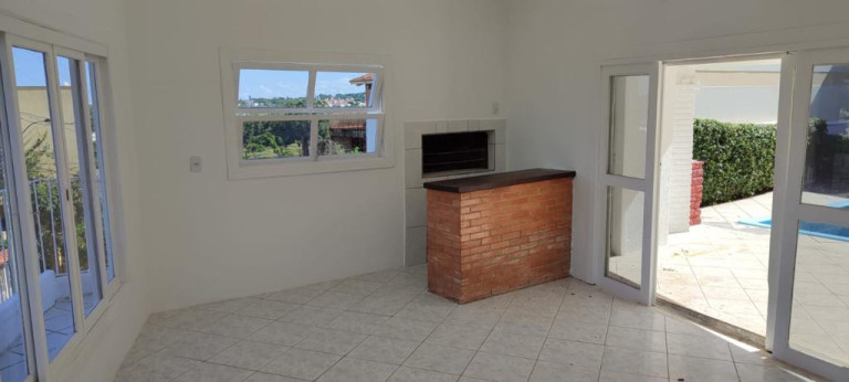 Imagem Casa com 3 Quartos à Venda, 310 m² em Vila Nova - Porto Alegre Imagem Casa com 3 Quartos à Venda, 310 m² em Vila Nova - Porto Alegre