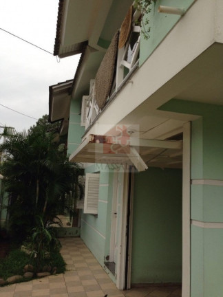 Imagem Casa com 3 Quartos à Venda, 100 m² em Ipanema - Porto Alegre Imagem Casa com 3 Quartos à Venda, 100 m² em Ipanema - Porto Alegre