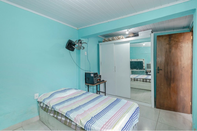 Imagem Casa com 4 Quartos à Venda, 170 m² em Vila Nova - Porto Alegre Imagem Casa com 4 Quartos à Venda, 170 m² em Vila Nova - Porto Alegre