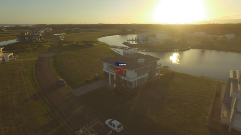 Imagem Casa de Condomínio com 4 Quartos à Venda, 300 m² em Capão Novo - Capão Da Canoa