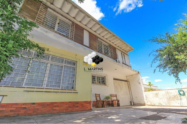 Casa com 5 Quartos à Venda, 254 m² em Três Figueiras - Porto Alegre