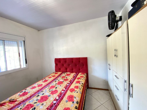 Imagem Casa com 2 Quartos à Venda, 58 m² em Hípica - Porto Alegre Imagem Casa com 2 Quartos à Venda, 58 m² em Hípica - Porto Alegre