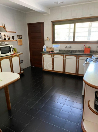 Imagem Casa com 4 Quartos à Venda, 480 m² em Santo Antônio - Porto Alegre