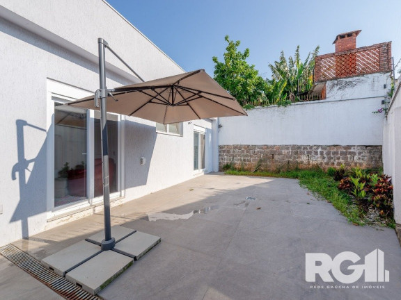 Imagem Casa com 3 Quartos à Venda, 400 m² em Três Figueiras - Porto Alegre Imagem Casa com 3 Quartos à Venda, 400 m² em Três Figueiras - Porto Alegre