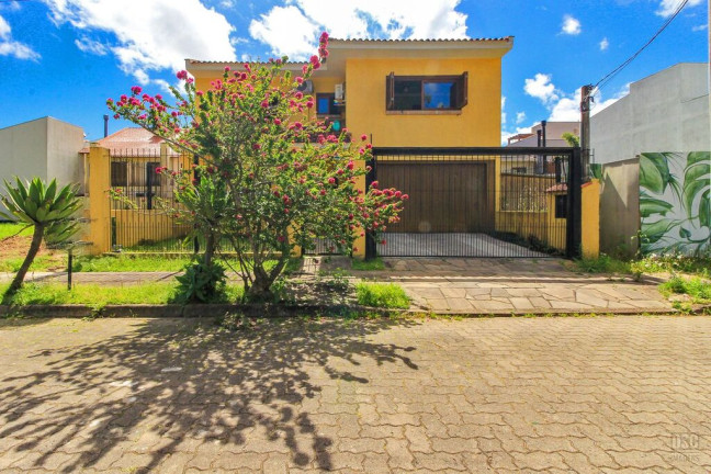 Imagem Casa com 3 Quartos à Venda, 197 m² em Hípica - Porto Alegre Imagem Casa com 3 Quartos à Venda, 197 m² em Hípica - Porto Alegre