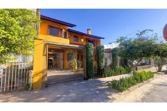 Imagem Casa com 4 Quartos à Venda, 307 m² em Partenon - Porto Alegre Imagem Casa com 4 Quartos à Venda, 307 m² em Partenon - Porto Alegre