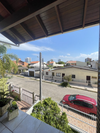 Imagem Casa com 4 Quartos à Venda, 240 m² em Centro - Torres Imagem Casa com 4 Quartos à Venda, 240 m² em Centro - Torres