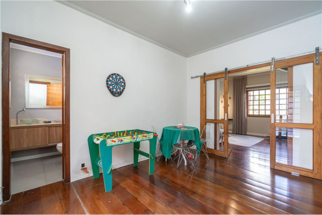 Imagem Casa com 4 Quartos à Venda, 300 m² em Jardim Lindóia - Porto Alegre Imagem Casa com 4 Quartos à Venda, 300 m² em Jardim Lindóia - Porto Alegre
