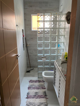 Imagem Casa de Condomínio com 3 Quartos à Venda, 128 m² em Massaguaçu - Caraguatatuba