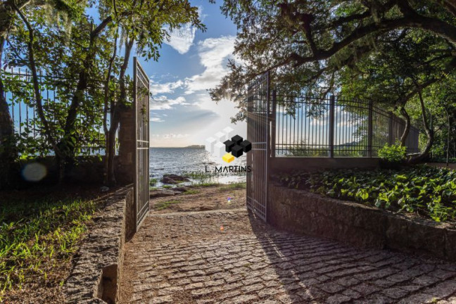 Imagem Casa de Condomínio com 3 Quartos à Venda, 441 m² em Pedra Redonda - Porto Alegre