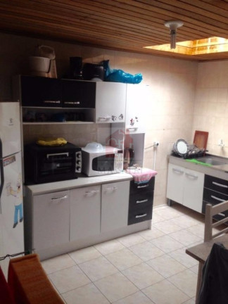 Imagem Casa com 3 Quartos à Venda, 130 m² em Vila Nova - Porto Alegre Imagem Casa com 3 Quartos à Venda, 130 m² em Vila Nova - Porto Alegre