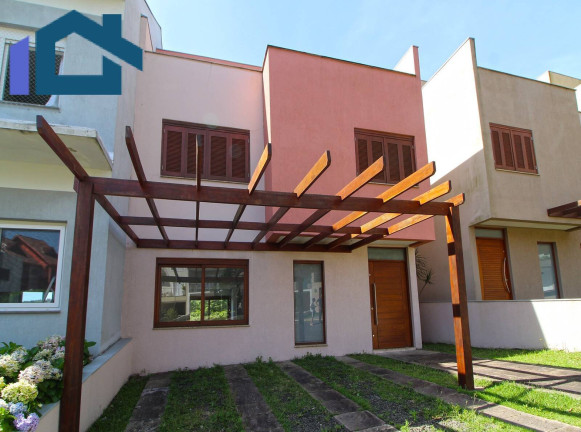 Imagem Sobrado com 3 Quartos à Venda, 224 m² em Vila Nova - Porto Alegre
