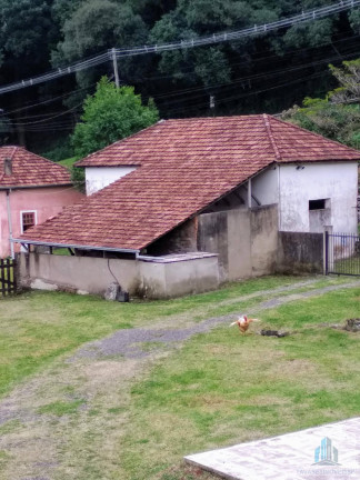 Imagem Chácara com 4 Quartos à Venda, 245 m²