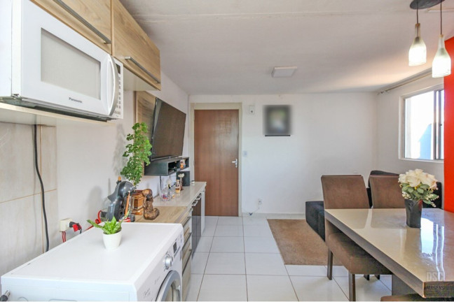 Imagem Imóvel com 2 Quartos à Venda, 39 m² em Vila Nova - Porto Alegre Imagem Imóvel com 2 Quartos à Venda, 39 m² em Vila Nova - Porto Alegre