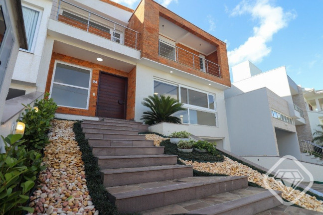 Imagem Casa de Condomínio com 3 Quartos à Venda, em Hípica - Porto Alegre Imagem Casa de Condomínio com 3 Quartos à Venda, em Hípica - Porto Alegre