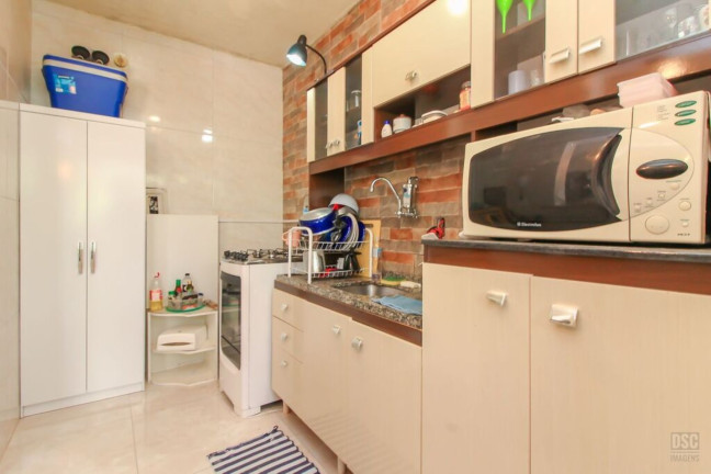 Imagem Imóvel com 3 Quartos à Venda, 63 m² em Santo Antônio - Porto Alegre Imagem Imóvel com 3 Quartos à Venda, 63 m² em Santo Antônio - Porto Alegre