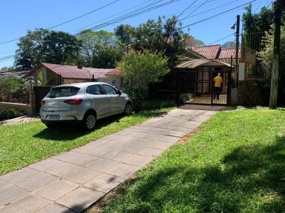 Imagem Casa com 4 Quartos à Venda,  em Santa Tereza - Porto Alegre