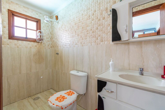 Imagem Casa com 4 Quartos à Venda, 165 m² em Igara - Canoas Imagem Casa com 4 Quartos à Venda, 165 m² em Igara - Canoas