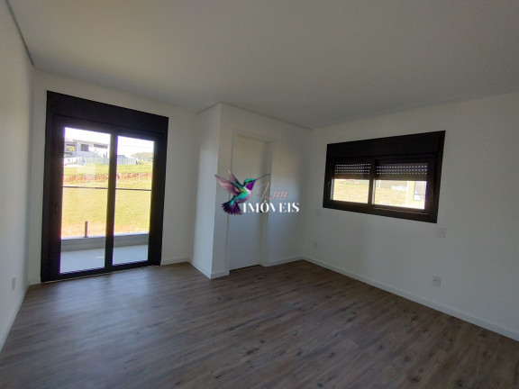 Imagem Casa de Condomínio com 3 Quartos à Venda, 233 m² em Coronel Nassuca - Guaíba