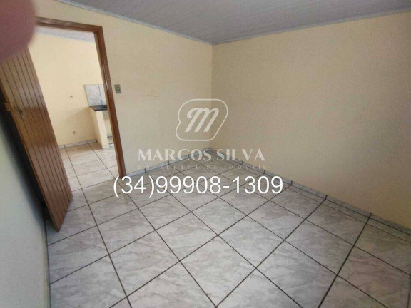 Imagem Casa com 3 Quartos à Venda, 250 m² em Santa Mônica - Uberlândia Imagem Casa com 3 Quartos à Venda, 250 m² em Santa Mônica - Uberlândia