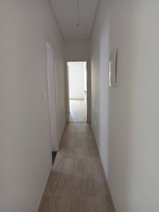 Imagem Sobrado com 4 Quartos à Venda, 215 m² em Canto Do Forte - Praia Grande