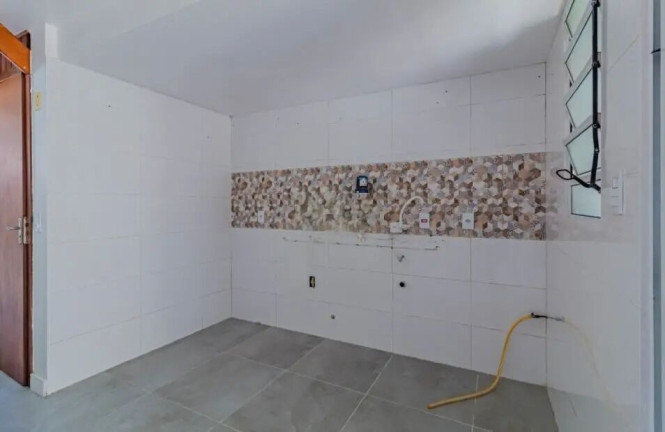 Imagem Casa de Condomínio com 2 Quartos à Venda, 67 m² em Sarandi - Porto Alegre