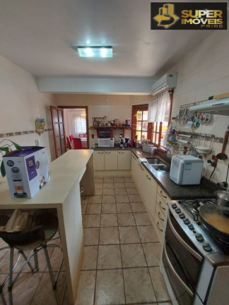 Imagem Casa com 4 Quartos à Venda, 360 m² em Centro - Pelotas