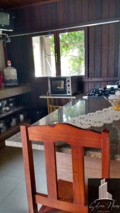 Imagem Casa com 4 Quartos à Venda, 252 m² em Jaguaruna