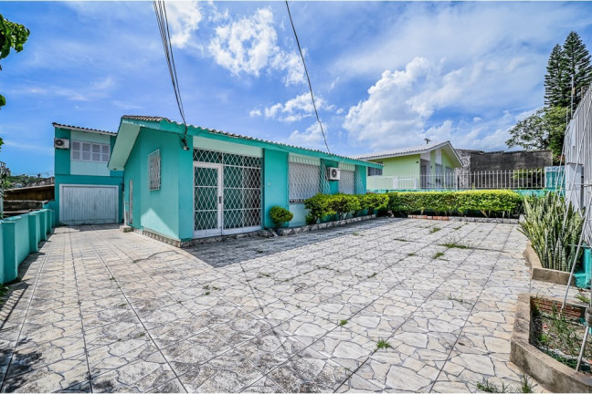 Imagem Casa com 3 Quartos à Venda, 198 m² em Santa Tereza - Porto Alegre Imagem Casa com 3 Quartos à Venda, 198 m² em Santa Tereza - Porto Alegre