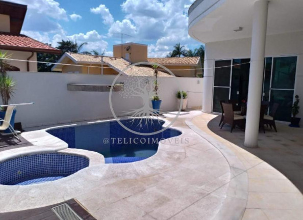 Imagem Casa de Condomínio com 4 Quartos à Venda, 414 m²