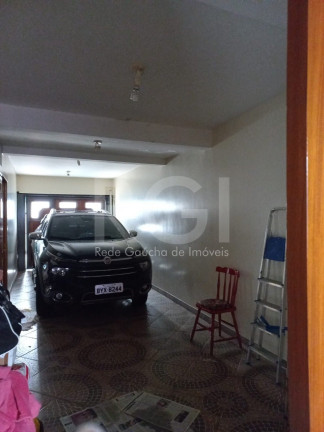 Imagem Casa com 3 Quartos à Venda, 210 m² em Jardim Do Bosque - Cachoeirinha Imagem Casa com 3 Quartos à Venda, 210 m² em Jardim Do Bosque - Cachoeirinha