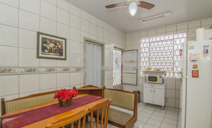 Imagem Casa com 3 Quartos à Venda, 90 m² em Santa Maria Goretti - Porto Alegre