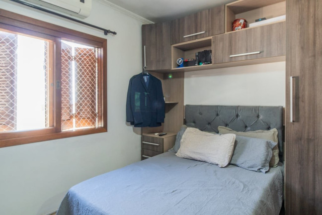 Imagem Casa com 2 Quartos à Venda, 127 m² em Vila Nova - Porto Alegre Imagem Casa com 2 Quartos à Venda, 127 m² em Vila Nova - Porto Alegre