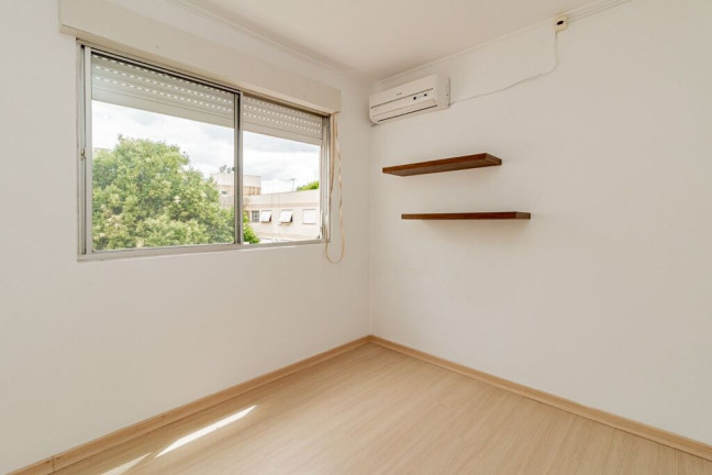 Imagem Apartamento com 2 Quartos à Venda, 56 m² em Santo Antônio - Porto Alegre Imagem Apartamento com 2 Quartos à Venda, 56 m² em Santo Antônio - Porto Alegre