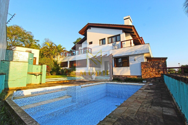Imagem Casa com 4 Quartos à Venda, 600 m² em Teresópolis - Porto Alegre Imagem Casa com 4 Quartos à Venda, 600 m² em Teresópolis - Porto Alegre