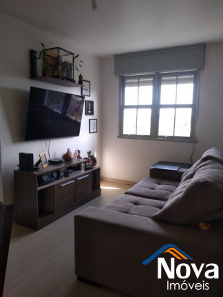Imagem Imóvel com 2 Quartos à Venda, 79 m² em Santo Antônio - Porto Alegre Imagem Imóvel com 2 Quartos à Venda, 79 m² em Santo Antônio - Porto Alegre