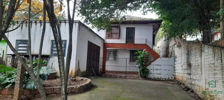 Imagem Casa com 3 Quartos à Venda, 300 m² em Vila Nova - Porto Alegre Imagem Casa com 3 Quartos à Venda, 300 m² em Vila Nova - Porto Alegre