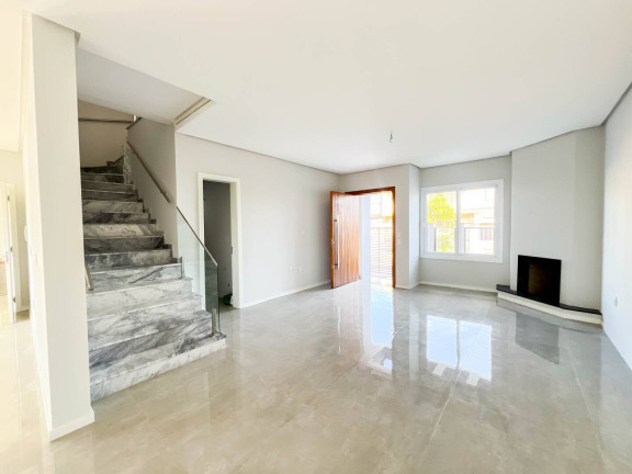 Imagem Sobrado com 3 Quartos à Venda, 220 m² em Estância Velha - Canoas Imagem Sobrado com 3 Quartos à Venda, 220 m² em Estância Velha - Canoas