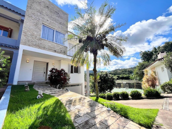 Imagem Casa com 3 Quartos à Venda, 300 m² em Vila Nova - Porto Alegre Imagem Casa com 3 Quartos à Venda, 300 m² em Vila Nova - Porto Alegre