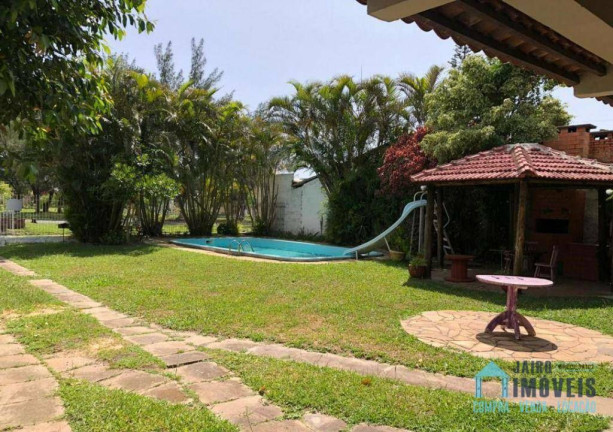 Imagem Casa com 4 Quartos à Venda, 249 m² em Centro - Tramandaí Imagem Casa com 4 Quartos à Venda, 249 m² em Centro - Tramandaí