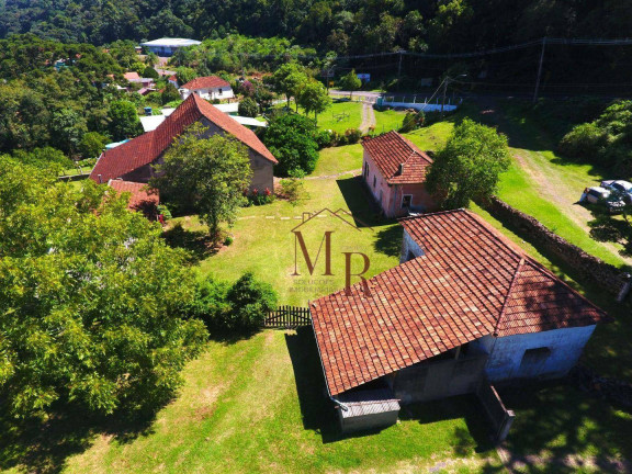 Imagem Casa com 6 Quartos à Venda, 755 m² em Belvedere - Morro Reuter