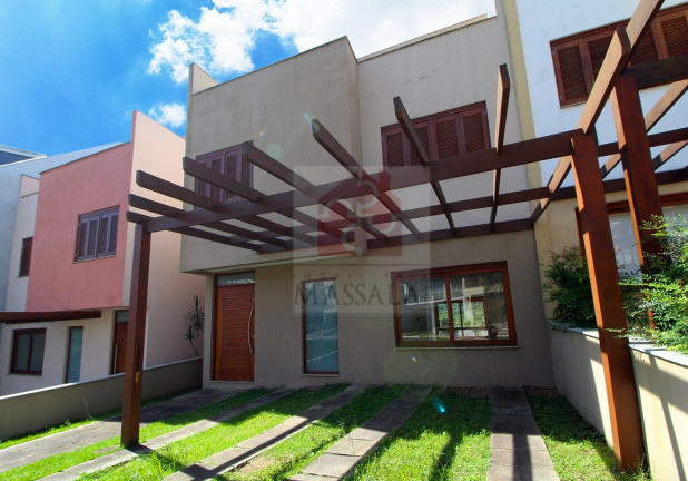 Imagem Casa com 3 Quartos à Venda, 240 m² em Vila Nova - Porto Alegre Imagem Casa com 3 Quartos à Venda, 240 m² em Vila Nova - Porto Alegre