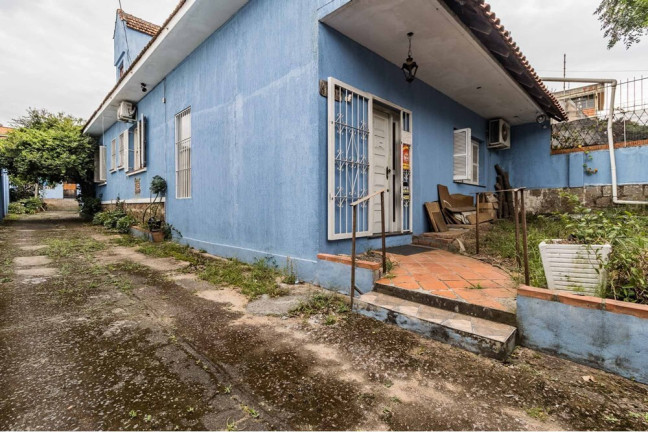 Imagem Casa com 3 Quartos à Venda, 260 m² em Partenon - Porto Alegre Imagem Casa com 3 Quartos à Venda, 260 m² em Partenon - Porto Alegre
