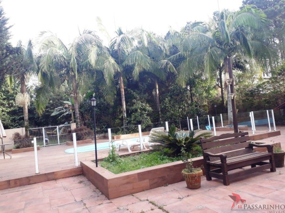 Imagem Casa com 4 Quartos à Venda, 317 m² em Centenário - Torres